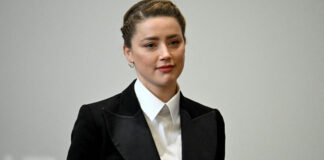 Brownish-yellow Heard asserts Johnny Depp tossed a phone in her face Brownish-yellow Heard asserts Johnny Depp tossed a phone in her face